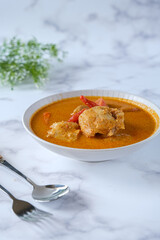 gulai ikan is Indonesian food made from fish, spices and coconut milk
