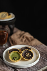 pie susu, milk pie, chocolate and matcha in mini size on the table