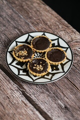 pie susu, milk pie, chocolate and matcha in mini size on the table