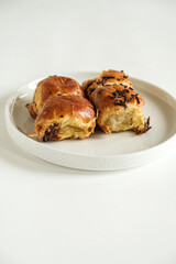 pisang bolen is made from bananas covered in rolled sheet of pasrty dough. various topping such as cheese and chocolate. selective focus