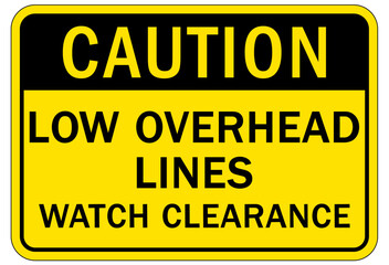 Low clearance warning sign and labels low overhead lines. Watch clearance