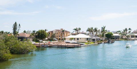 Luxury housing developments right on the canal off the Gulf of Mexico. North Naples, Florida.