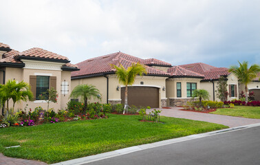 Fototapeta na wymiar Cloudy, stormy day in South Florida luxury golf community. Real estate background