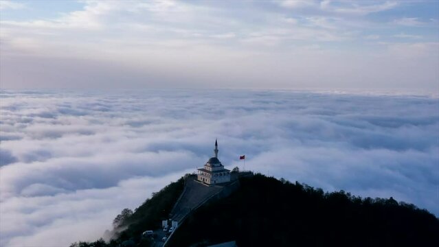 Aerial view of the mosque on the top of the mountain by drone - Hyperlapse