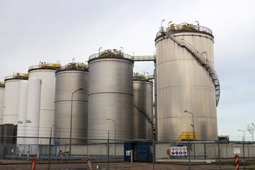Refinery installation and tanks in the Botlek harbor at the port of Rotterdam