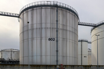 Tanks for oil and petro storage at the Pernis harbor in the port of Rotterdam