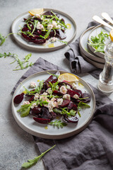 Beetroot cheese salad carpaccio with arugula and lemon