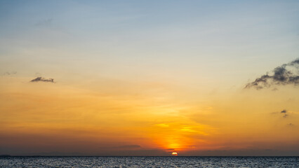 Fototapeta na wymiar sunset sky over the sea in evening