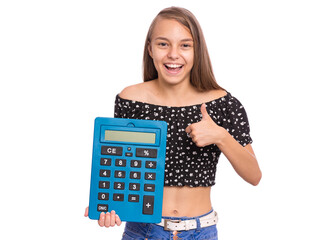 Smart female student holding big calculator and making Teen girl isolated on white. Happy cheerful child looking at camera. Back to school. - 583548880