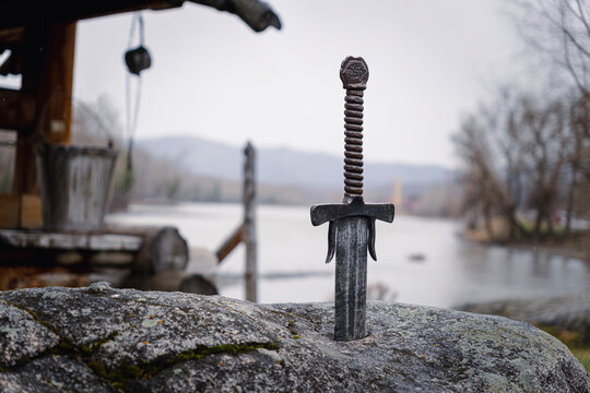 Excalibur, King Arthur's sword in stone. Edged weapons from the legend Pro king Arthur.