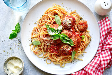 Pasta spaghetti with meat ball in tomato sauce . Top view.