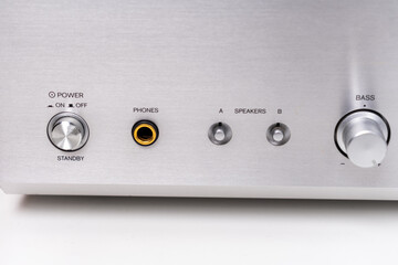 closeup view on vintage stereo audio amplifier