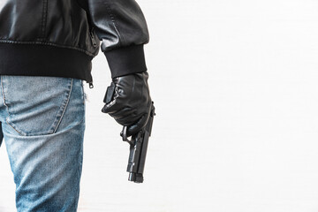 firearms for self-defense. The concept of legalizing the sale of weapons. Hands holding gun...