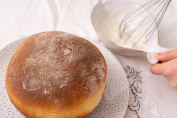 Easter cake and whisk with frosting