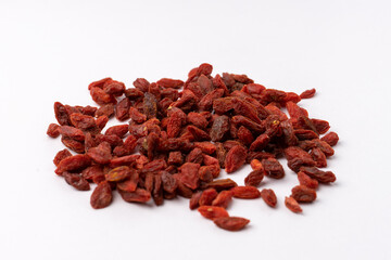 a heap of goji berries isolated on white background