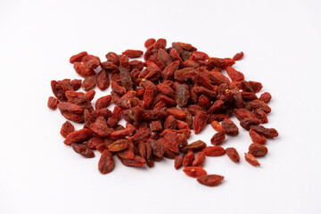 a heap of goji berries isolated on white background