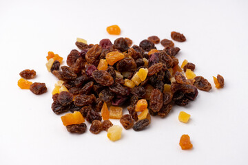 a pile of dried fruit mix isolated on white background