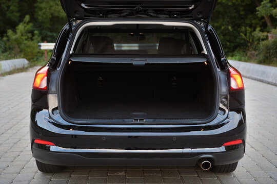 The empty trunk of a modern car station wagon.