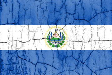 Flag of El Salvador on cracked wall, textured background.