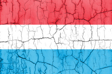 Flag of Luxembourg on cracked wall, textured background.