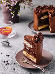 Plate with slice of tasty homemade chocolate cake