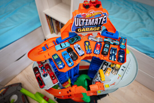 Kyiv, Ukraine - March, 2023: Collection of colorful toy cars. Hot Wheels Ultimate garage.