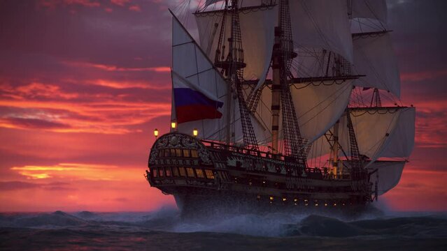 Sailboat floating in the ocean at sunset