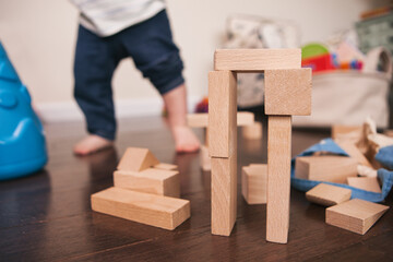 Focus On Building Block Creation With Child In Background