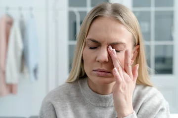 Foto op Plexiglas exhausted woman rubbing dry irritable eyes, closeup © brizmaker