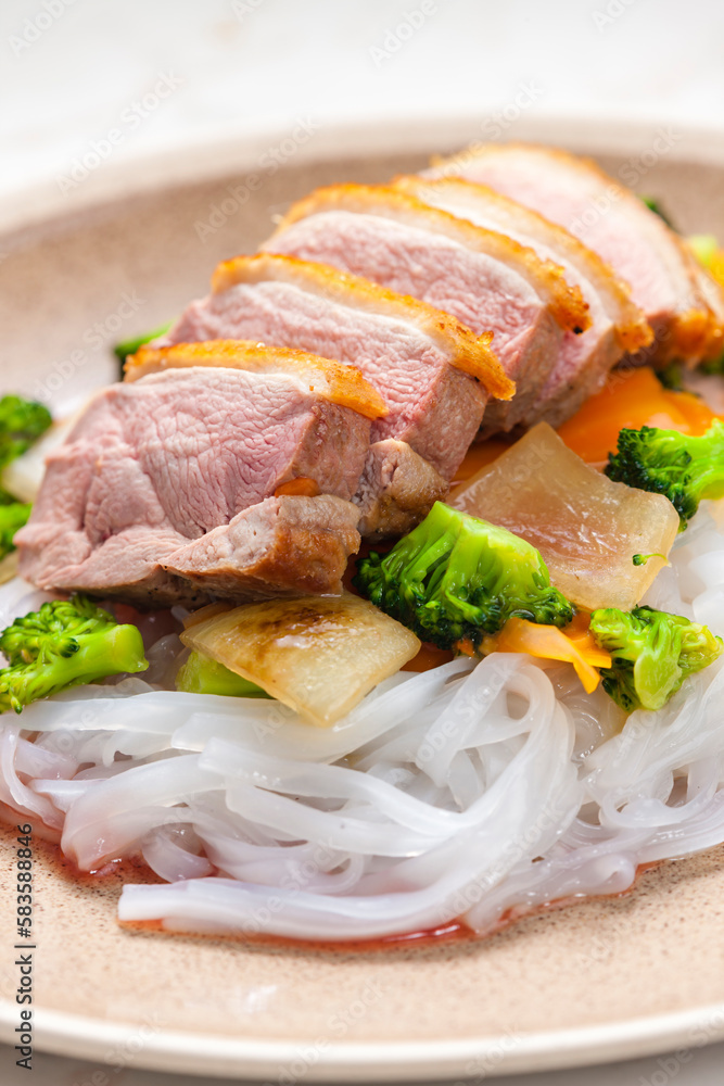 Wall mural baked duck breast with vegetables and rice noodles