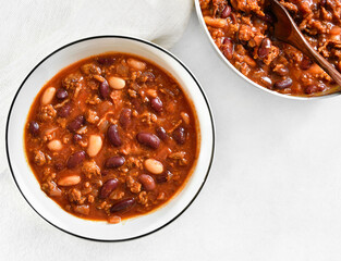 Stewed beans with ground beef, jalapeno pepper and bacon