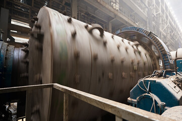 Ball mill grinds ore at mining and concentrating plant