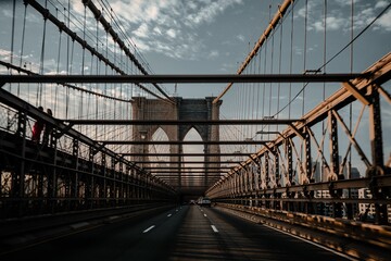 Beautiful shot of the Brooklyn Bridge with the road in New York City,USA