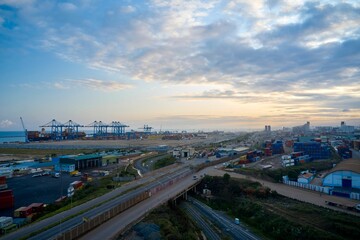 Naklejka na ściany i meble Bird's eye view of a sunset on a Tema port in Ghan