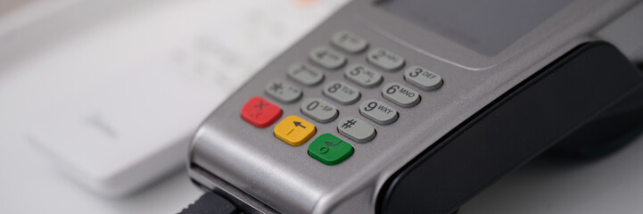 Fototapeta premium Payment terminal for receiving money and paying with bank card