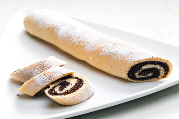 baked roll stuffed with poppy seeds