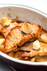 pork meat baked with garlic and onion