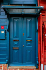 Large heavy wooden door  painted in blue in Kuzguncuk, Istabnbul.