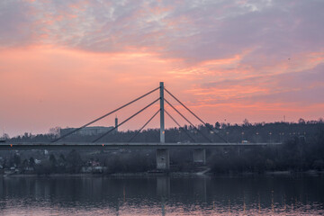 Fototapeta na wymiar Cable-stayed Liberty bridge in Novi Sad, Serbia, at sunrise