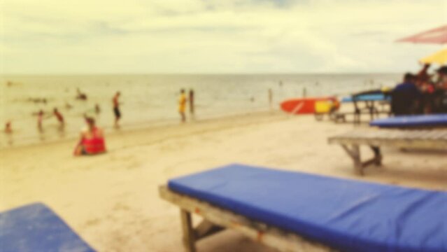 BLURRED BACKGROUND of a typical day on a Brazilian beach, TIME-LAPSE footage. Recorded at Coroa Vermelha beach, Santa Cruz Cabralia - BA.