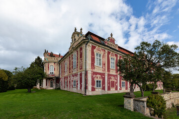 Fototapeta na wymiar Chateau Stekník - this Castle is one of the most important rococo buildings in the Czech Republic. It´s located near the city Žatec in region Ústí nad Labem, Czech Republic - Europe.