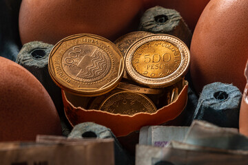 Coins and Colombian money in eggs