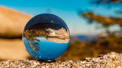 Fototapeta na wymiar Crystal ball landscape shot at Mount Dreisessel, Neureichenau, Bavarian forest, Bavaria, Germany