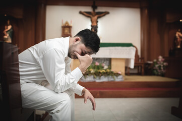 Christian man asking for blessings from God,Asian man praying to Jesus Christ