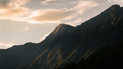 Naklejka na ściany i meble Landscape of the snow capped peak on the the Julian Alps under dusk sky in northwestern Slovenia