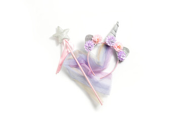 Fairy costume, unicorn on a white background. Top view, flay lay