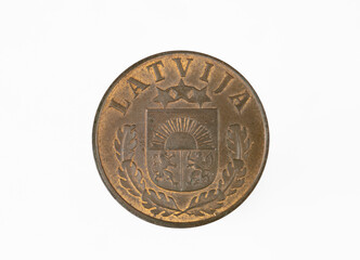 Two Latvian santimi coin (1939) isolated on white background