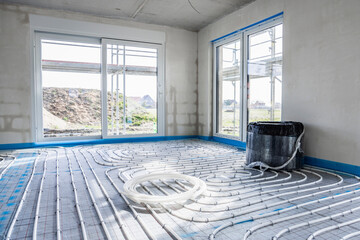 Interior of a building under construction with underfloor heating