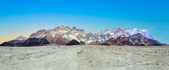 travelling in the death valley desert on empty road at Artist's palette with spectacular colorful...
