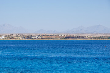 Fototapeta premium Hurghada, Egypt. . Buildings, swimming pools and a recreation area by the red sea.